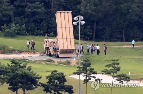 Officials from the defense and environment ministries measure electromagnetic radiation and noise from the site of the THAAD deployment in Seongju, some 300 kilometers south of Seoul, on Aug. 12, 2017, as part of the environmental survey on the controversial U.S. missile defense system. (Yonhap)