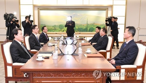 This photo, provided by Seoul's unification ministry on Jan. 17, 2018, shows working-level talks between the two Koreas on the North's participation in the PyeongChang Winter Olympics. (Yonhap)