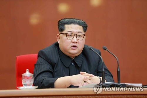 This photo, carried by the Rodong Sinmun, North Korea's official newspaper, on April 21, 2018, shows North Korean leader Kim Jong-un presiding over a plenary meeting of the ruling Workers' Party of Korea's central committee a day earlier. (For Use Only in the Republic of Korea. No Redistribution) (Yonhap)