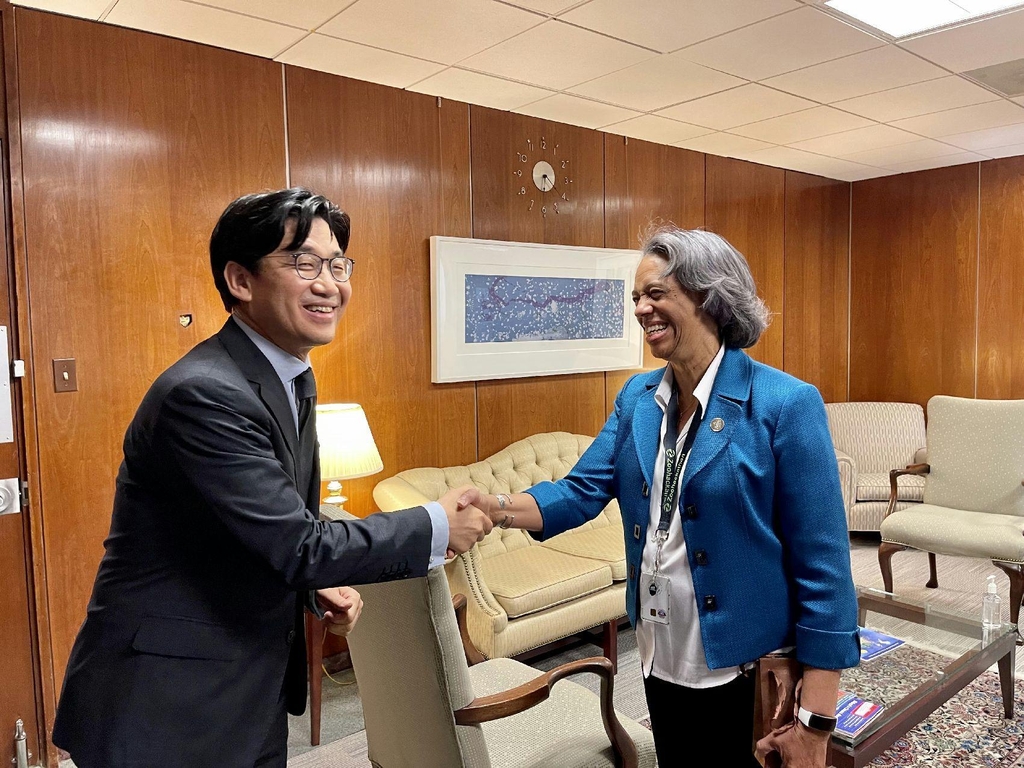 Second Vice Foreign Minister Choi Jong-moon (L) meets Marcia Bernicat, U.S. acting under secretary of state for economic growth, energy and the environment, in Washington D.C. during his trip this week, in this photo provided by the foreign ministry on July 22, 2021. (PHOTO NOT FOR SALE) (Yonhap) 