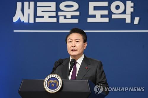 President Yoon Suk Yeol delivers a New Year's address from the presidential office in Seoul on Jan. 1, 2023, in this photo provided by his office. (PHOTO NOT FOR SALE) (Yonhap)