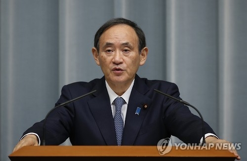 스가 관방장관