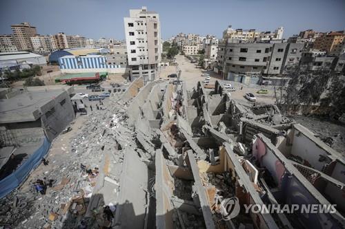 올해 5월 이스라엘군 공습으로 파괴된 가자지구 건물[EPA=연합뉴스 자료사진]