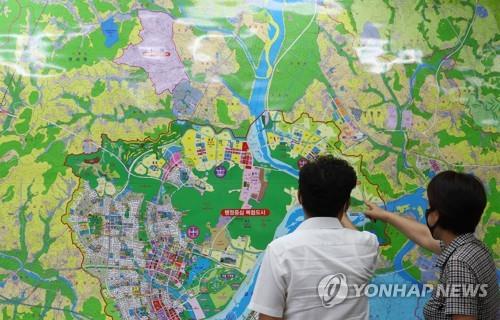 '국회·청와대 이전 발언'에 거둬들인 세종시 아파트 매물