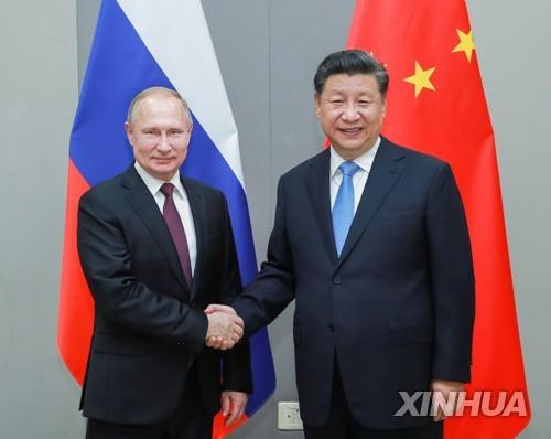 블라디미르 푸틴 러시아 대통령(왼쪽)과 시진핑 중국 국가주석[신화=연합뉴스 자료사진]