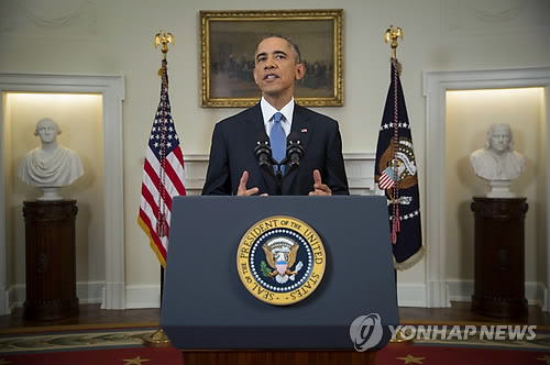 버락 오바마 미국 대통령이 쿠바와의 관계 정상화 성명을 발표하고 있다. (AP=연합뉴스)