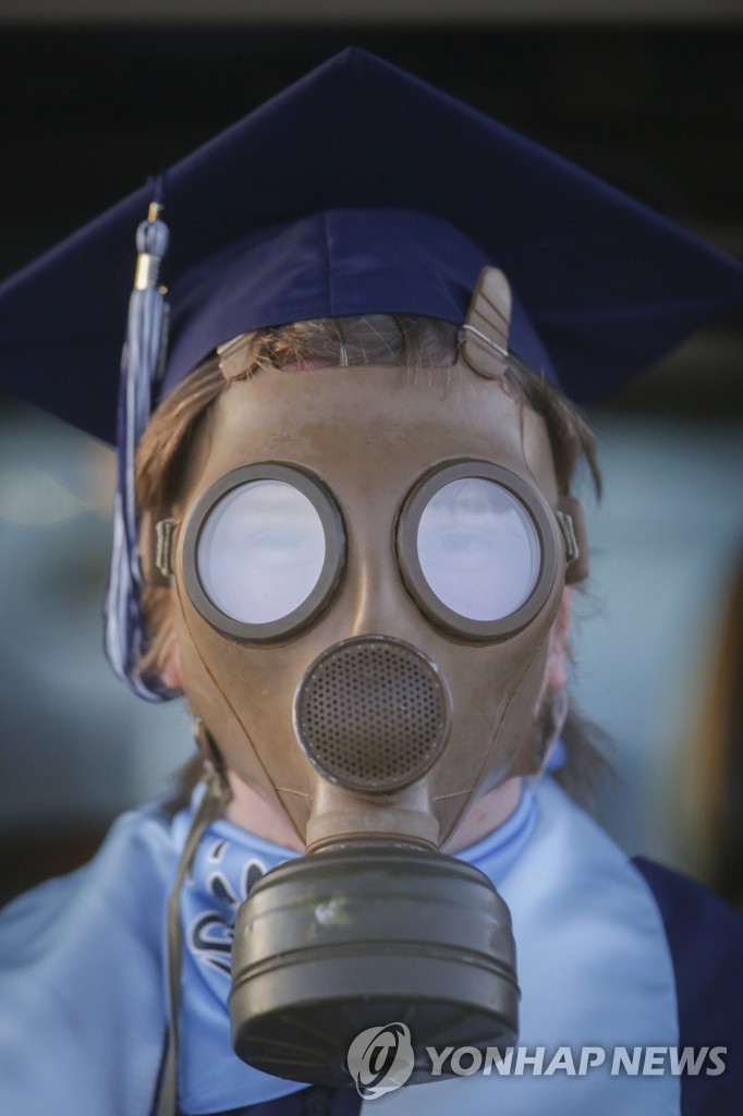 Virus Outbreak Idaho Graduation