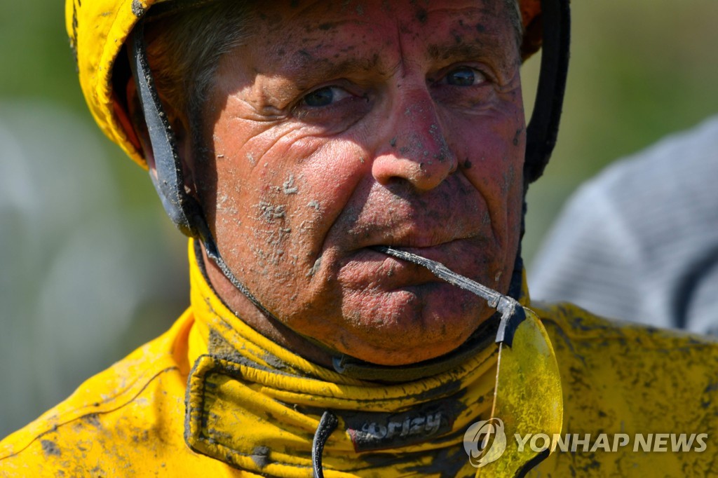 GERMANY-TRADITION-HORSE RACE-MUD-FEATURE