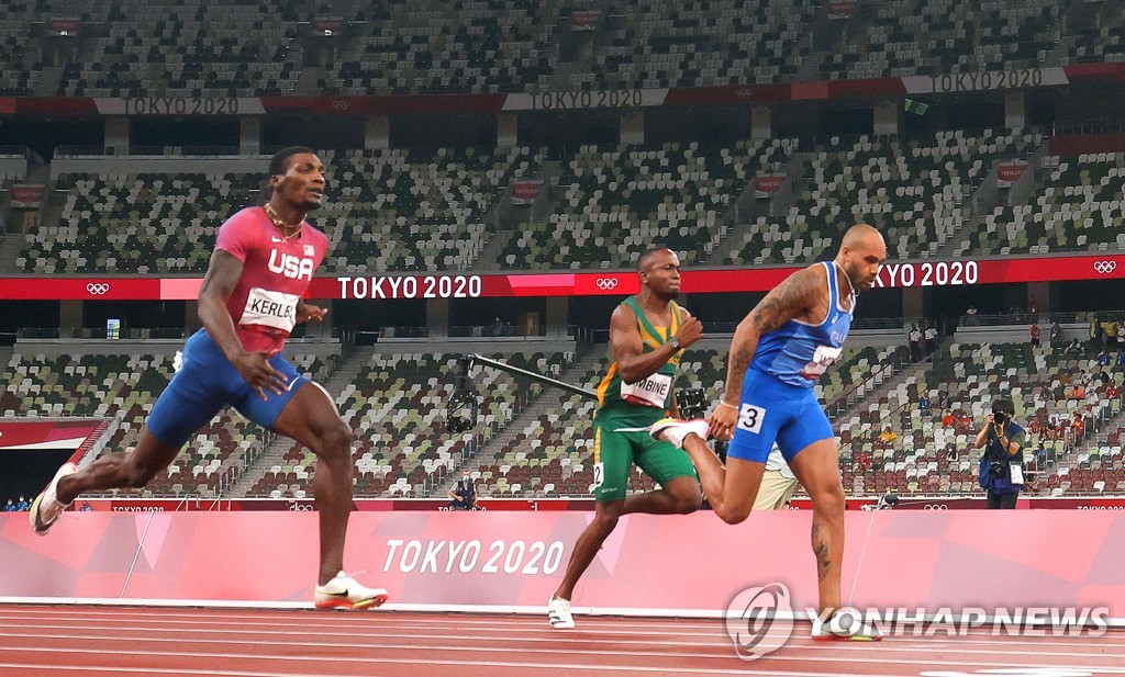 도쿄올림픽 육상 남자 100ｍ 금메달리스트 제이컵스(오른쪽)
