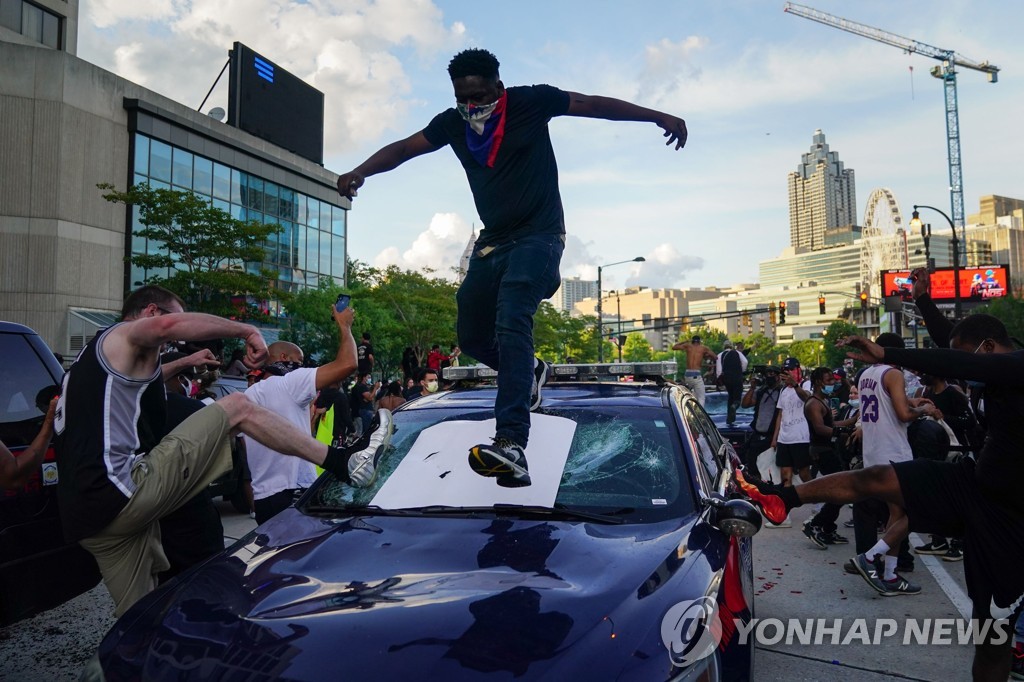 US-ATLANTA-PROTEST-HELD-IN-RESPONSE-TO-POLICE-CUSTODY-DEATH-OF-M