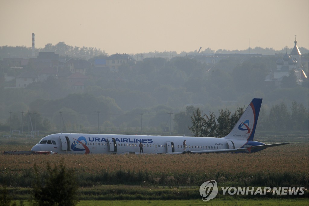 Dismantling Airbus A321 jet at crash landing site near Zhukovsky Airport