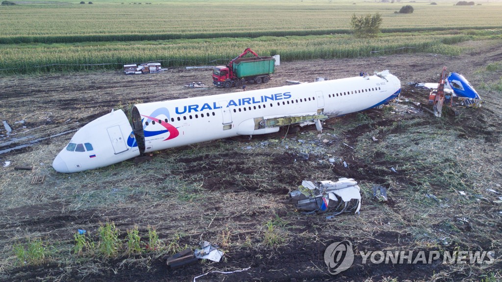 Dismantling Airbus A321 jet at crash landing site near Zhukovsky Airport