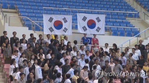 김우식 역도 금, 북한서 나란히 올라가는 태극기