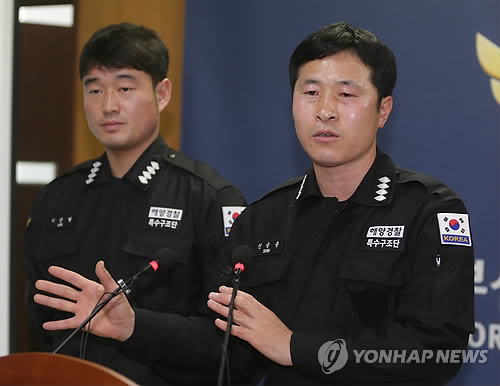 기름과 사투 벌인 해경 특수구조대원