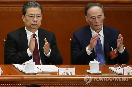 中전인대 참석한 왕치산과 자오러지