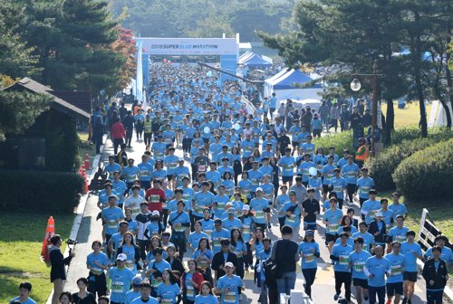 롯데, '장애인 인식 개선' 슈퍼블루 마라톤 대회 개최