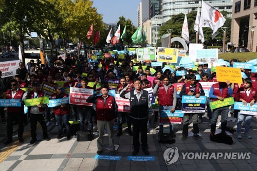 '모든 이주자에 대한 차별 반대!'