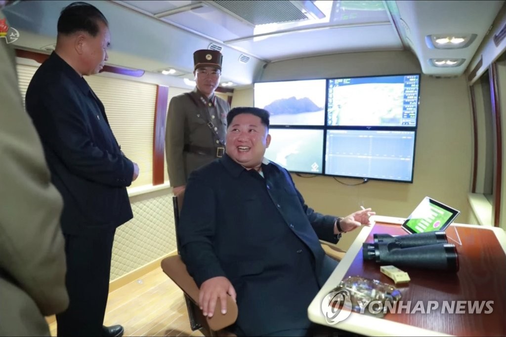 북한TV, '신형 대구경조종방사포 시험사격' 보도