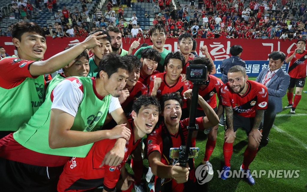 Gyeongnam FC players bask in victory Gyeongnam FC players bask in victory