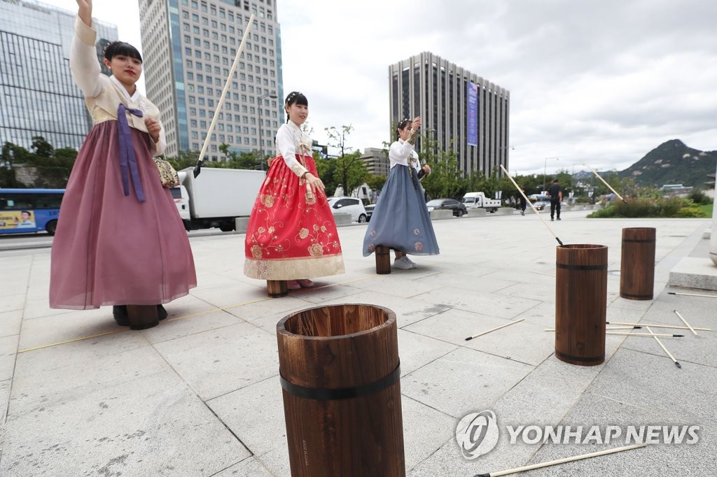 Playing traditional game Playing traditional game