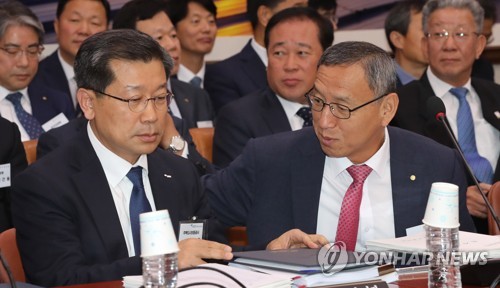 이야기하는 김학규 한국감정원 원장과 이재광 주택도시보증공사 사장