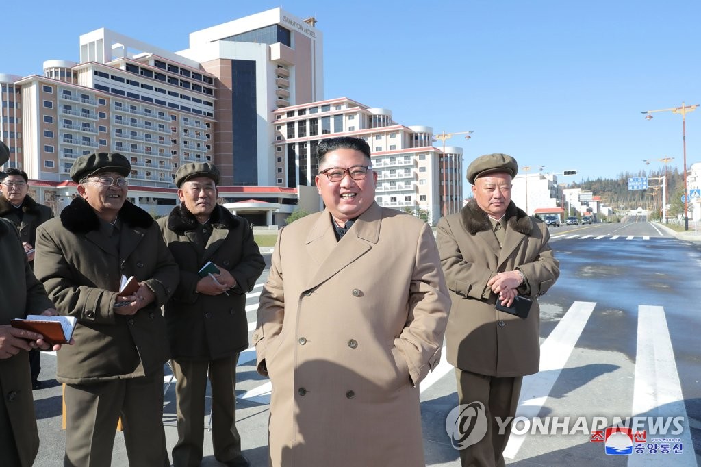 North Korean leader Kim Jong-un smiles during an inspection of construction sites in Samjiyon County near the country's tallest mountain of Paekdu in this photo provided by the Korean Central News Agency on Oct. 16, 2019. (For Use Only in the Republic of Korea. No Redistribution) (Yonhap)