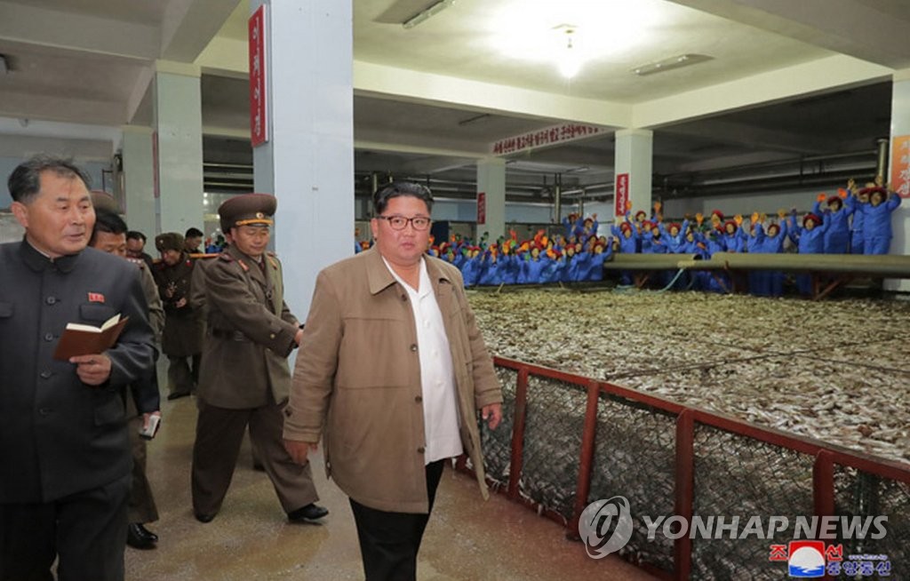 N.K. leader visits fish-processing facility N.K. leader visits fish-processing facility