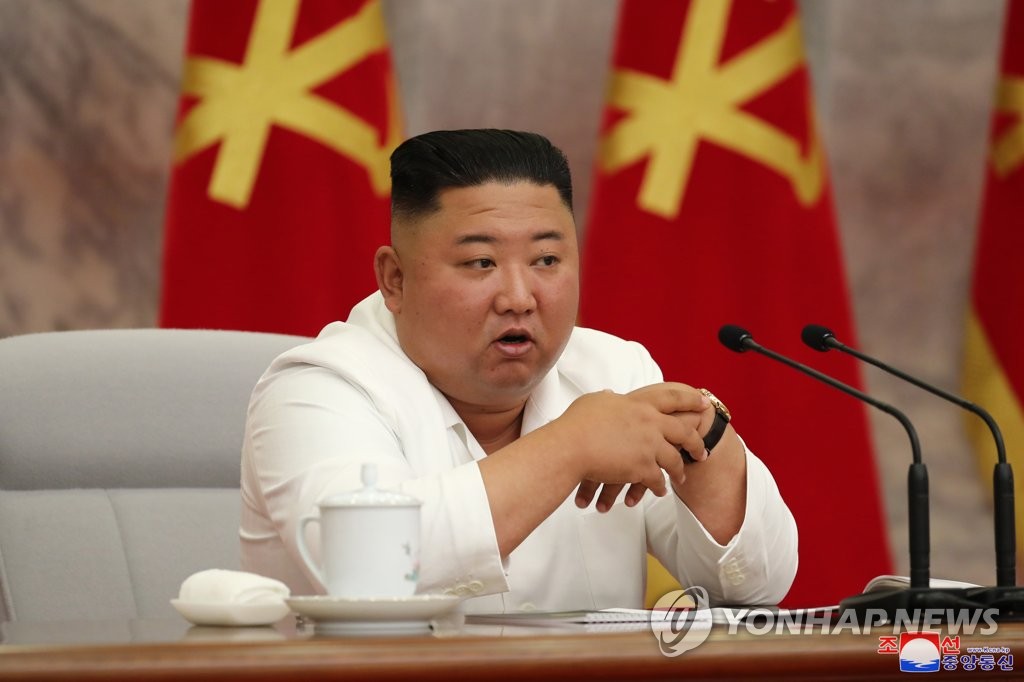 North Korean leader Kim Jong-un presides over a Politburo meeting of the ruling Workers' Party at the headquarters of the party's Central Committee in Pyongyang on July 2, 2020, in this photo released by the North's official Korean Central News Agency on July 3. Kim called for "maximum alert" against the new coronavirus, warning that premature easing of anti-virus measures will lead to an "unimaginable and irretrievable crisis," according to the agency. (For Use Only in the Republic of Korea. No Redistribution) (Yonhap)