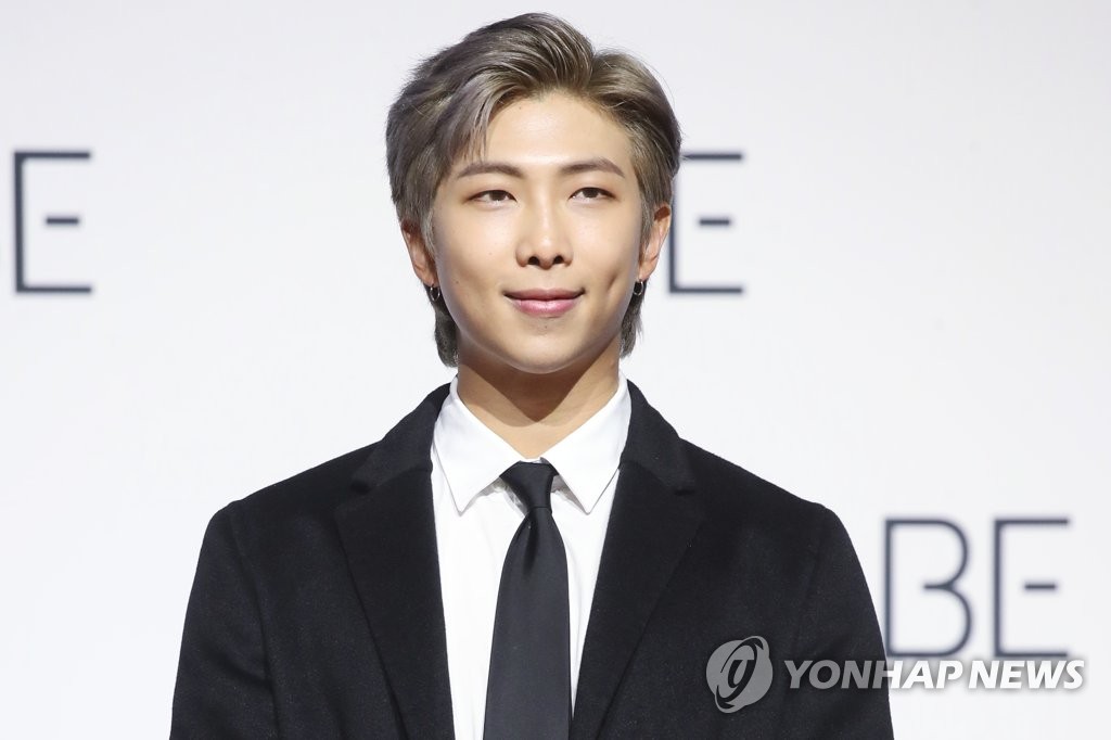 RM of BTS poses for the camera during a press conference held at the Dongdaemun Design Plaza in central Seoul on Nov. 20, 2020. (Yonhap)