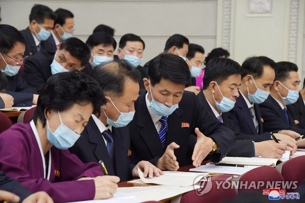 Delegates at the eighth congress of the ruling Workers' Party take part in a consultative meeting in Pyongyang on Jan. 11, 2021, to review a draft resolution on the policy goals rolled out by leader Kim Jong-un, in this photo released by the Korean Central News Agency the next day. (For Use Only in the Republic of Korea. No Redistribution) (Yonhap)