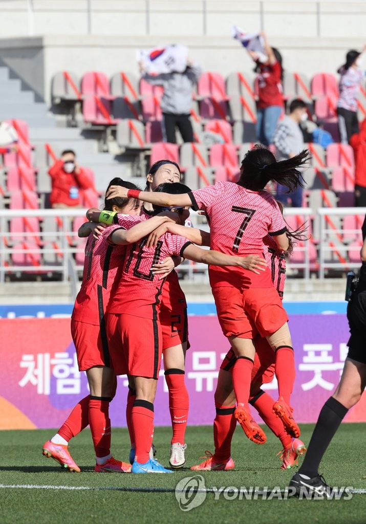 South Korean players celebrate a goal by Kang Chae-rim against China during the teams' Olympic women's football qualifying match at Goyang Stadium in Goyang, Gyeonggi Province, on April 8, 2021. (Yonhap)