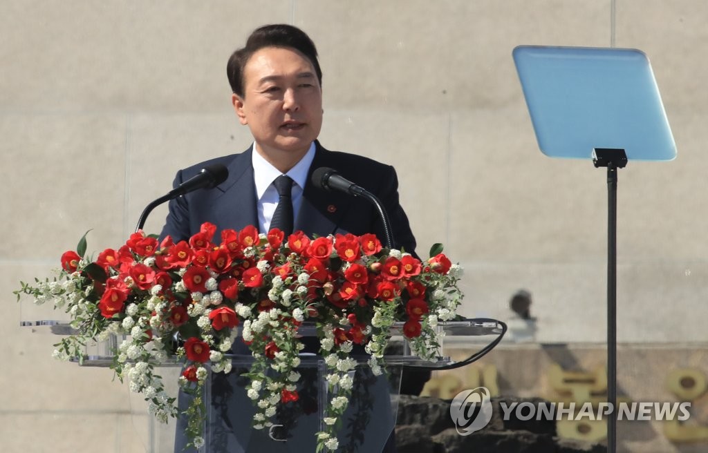 In this pool photo, President-elect Yoon Suk-yeol gives a speech during a memorial service commemorating victims of a 1948 massacre in Jeju Island at Jeju April 3 Peace Park on the southern island on April 3, 2022. (Yonhap)