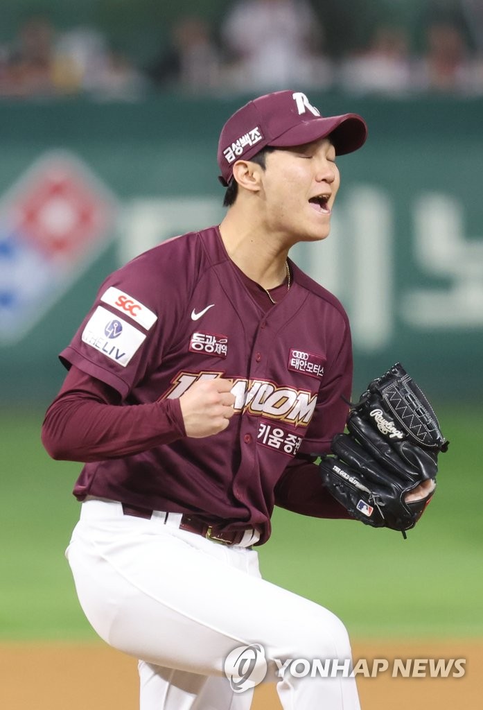 Kiwoom Heroes starter An Woo-jin celebrates after retiring the side against the SSG Landers during the bottom of the fourth inning of Game 5 of the Korean Series at Incheon SSG Landers Field in Incheon, 30 kilometers west of Seoul, on Nov. 7, 2022. (Yonhap)