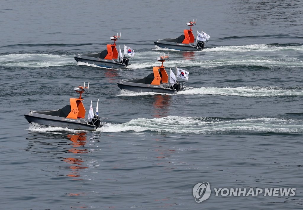 Navy's landing drill with manned, unmanned systems Navy's landing drill with manned, unmanned systems