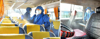 朝鲜《劳动新闻》2月27日报刊登平壤客货车队的防疫工作人员在公交车里进行消毒作业的照片。 韩联社/《劳动新闻》官网截图（图片仅限韩国国内使用，严禁转载复制） 