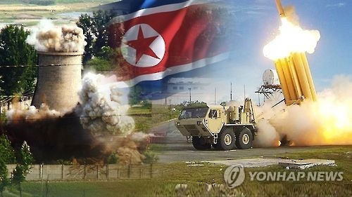 This undated file image shows an interceptor fired from a launcher which is part of a THAAD battery and the detonation of a nuclear device in North Korea against the North's flag. (Yonhap)