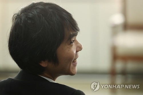 (Yonhap Interview) S. Korean Go master says upgraded AlphaGo 'too strong' for humans
