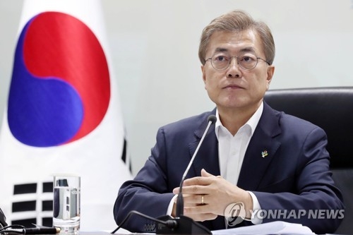This photo, provided by the presidential office Cheong Wa Dae on June 8, 2017, shows President Moon Jae-in presiding over a National Security Council meeting at the presidential compound's crisis management center in Seoul. (Yonhap)