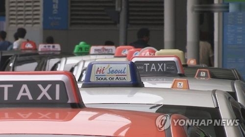 Seoul taxi drivers to wear uniforms from this fall - 2