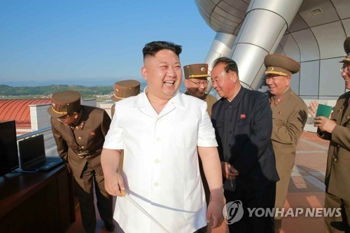 North Korean leader Kim Jong-un observes the launching of a new surface-to-ship cruise missile in this photo published by the country's daily Rodong Sinmun on June 9, 2017. (For Use Only in the Republic of Korea. No Redistribution) (Yonhap)