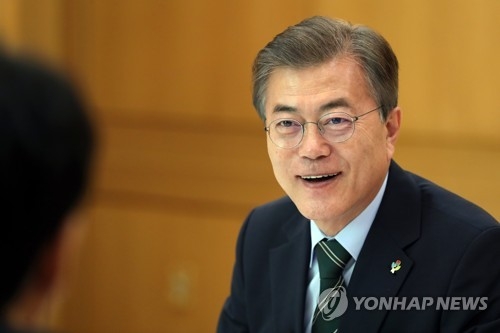 This photo, provided by the presidential office on June 22, 2017, shows President Moon Jae-in speaking during an interview with Reuters at his office Cheong Wa Dae in Seoul. (Yonhap)