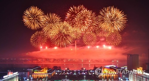 Massive fireworks are displayed to welcome New Year's Day in Pyongyang on Jan. 1, 2018, in this photo released by the (North) Korean Central News Agency. (For Use Only in the Republic of Korea. No Redistribution) (Yonhap)