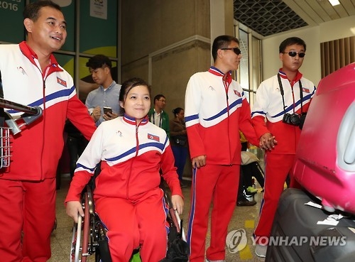 In this file photo taken on Sept. 4, 2016, North Korean Paralympic athlete Song Kum-jong (2nd from L) arrives in Rio de Janeiro to compete at the 2016 Summer Paralympics. (Yonhap) 