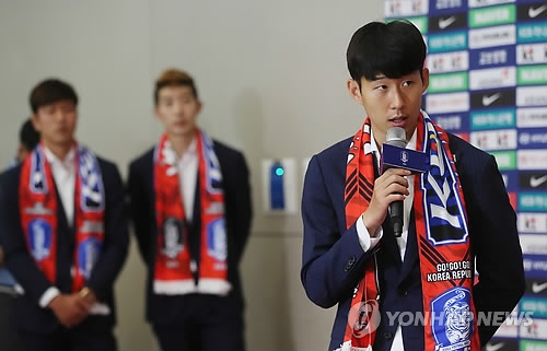 In this file photo taken on June 29, 2018, Son Heung-min speaks at Incheon International Airport in Incheon following the national football team's return from the 2018 FIFA World Cup in Russia. (Yonhap)