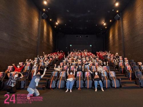 This undated photo, provided by the Bucheon International Fantastic Film Festival, shows the audience at a theater amid the novel coronavirus outbreak. (PHOTO NOT FOR SALE) (Yonhap)