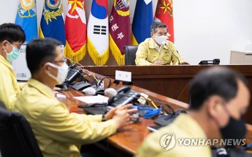 Defense Minister Jeong Kyeong-doo presides over an emergency meeting of military leaders in Seoul on Aug. 24, 2020, to discuss safety steps against the approaching Typhoon Bavi, in this photo provided by his office. (PHOTO NOT FOR SALE) (Yonhap)