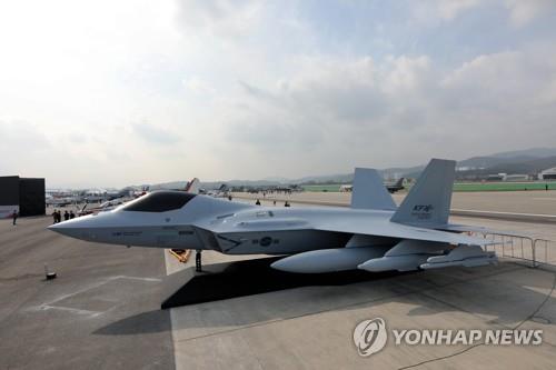 This photo provided by the organizer of the Seoul International Aerospace & Defense Exhibition (ADEX) on Oct. 20, 2019, shows a mock-up of the KF-X fighter jet, South Korea's envisioned indigenous cutting-edge fighter aircraft, which is on display during the opening ceremony of the exhibition held at Seoul Air Base, east of Seoul. (PHOTO NOT FOR SALE) (Yonhap)