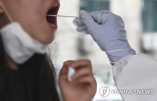 A middle school student in Daejeon receives a COVID-19 test on Sept. 11, 2020. (Yonhap) 
