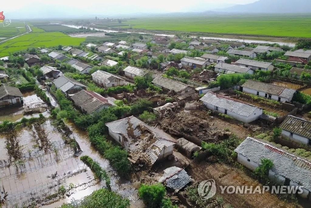 In this photo, captured from the Korean Central Television Broadcasting Station on Aug. 7, 2020, many houses are damaged and flooded at a village in Unpha, North Hwanghae Province, which North Korean leader Kim Jong-un visited. The broadcaster stopped short of saying when he made the visit, but Kim is believed to have visited the village the previous day. (For Use Only in the Republic of Korea. No Redistribution) (Yonhap)
