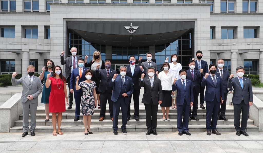 This photo provided by the defense ministry shows Defense Minister Suh Wook (4th from L, front) posing with the U.S. delegation of the Congressional Study Group on Korea and ministry officials in Seoul on July 7, 2021. (PHOTO NOT FOR SALE